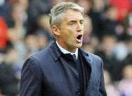 Mancini calme Wenger