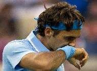 Federer simpose a Bale