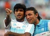 OM un maitre chien pour Lucho et Heinze