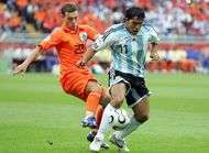 Vers un echange royal Tevez Sneijder