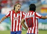 Aguero dessoude par Forlan